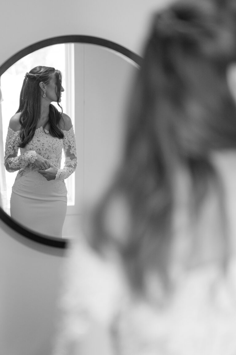 photo of the bride in front of the mirror